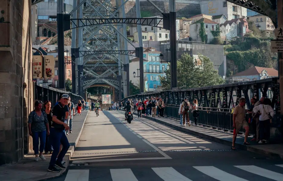 Pedestrian and vehicle traffic on Dom Luís I Bridge in Porto