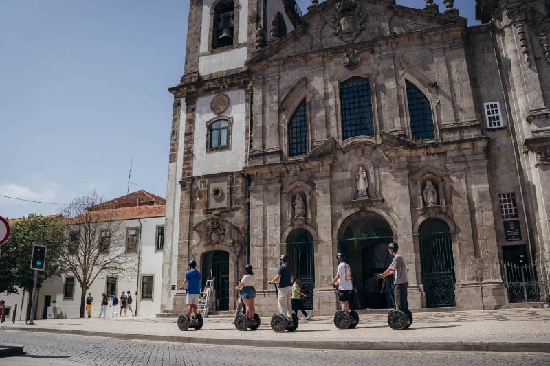 Segway group visiting a historic monument in Porto